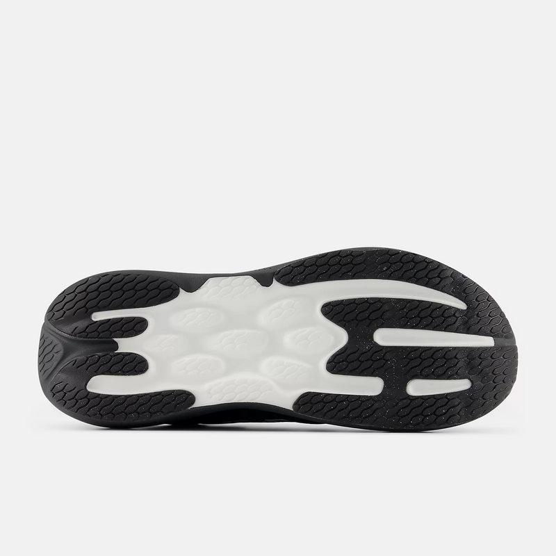 New Balance 1080v15 running shoes outsole with textured black and white rubber, sole view.