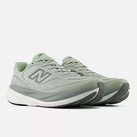 New Balance 1080v15 running shoes in sage green with mesh upper, side angle view.