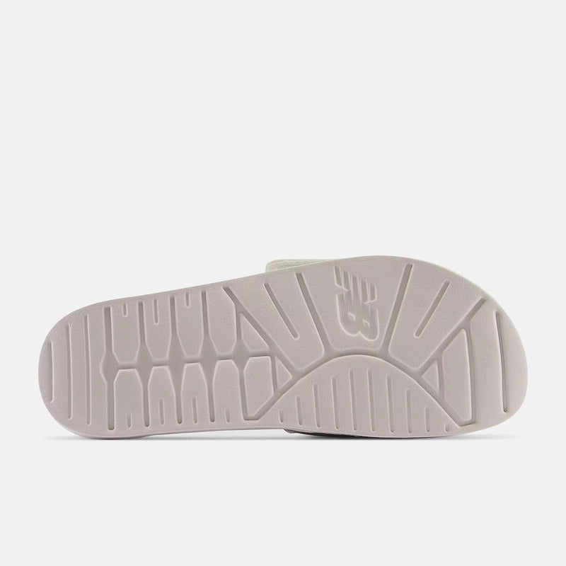 New Balance 200v2 Adjustable sandals with grooved outsole detail in light gray, sole view.
