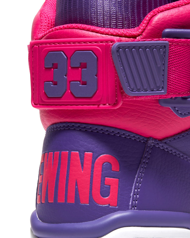 Ewing Athletics 33 HI "Neon Signs" sneakers featuring bold purple and pink leather with large "33" strap detail, back angle close-up.