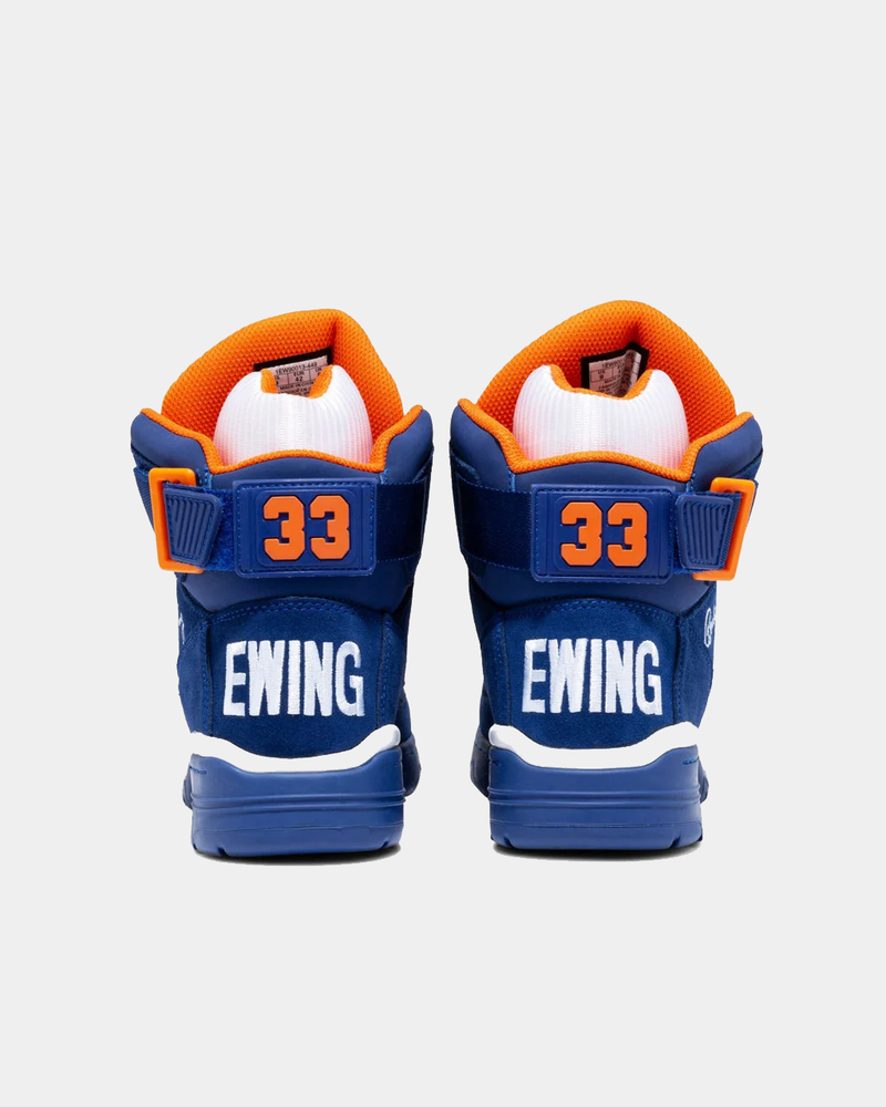 Ewing Athletics 33 HI OG sneakers in navy blue with orange accents, embroidered branding and "33" detailing, back view.