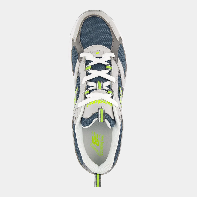 New Balance 408 running shoes top view with white laces, navy mesh upper, gray overlays, and neon green accents.