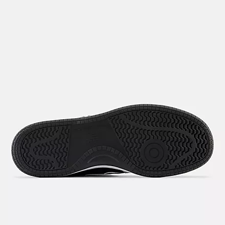 New Balance 480 sneakers, black rubber outsole with traction pattern, sole view.