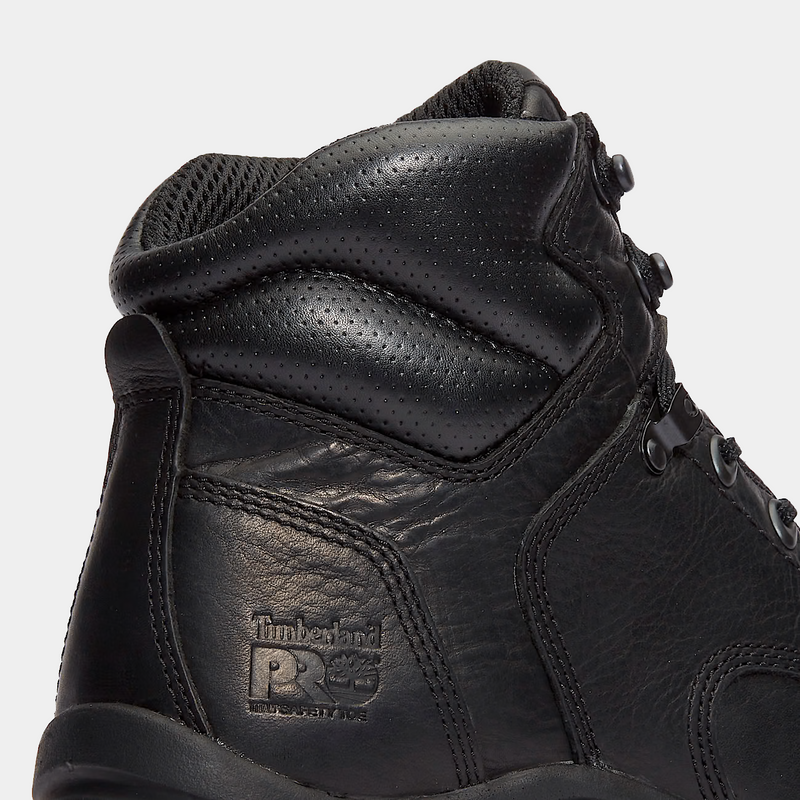 Timberland Pro 6" Titan Safety Toe Comfort Work Boots in black leather with padded collar and embossed logo, side view.
