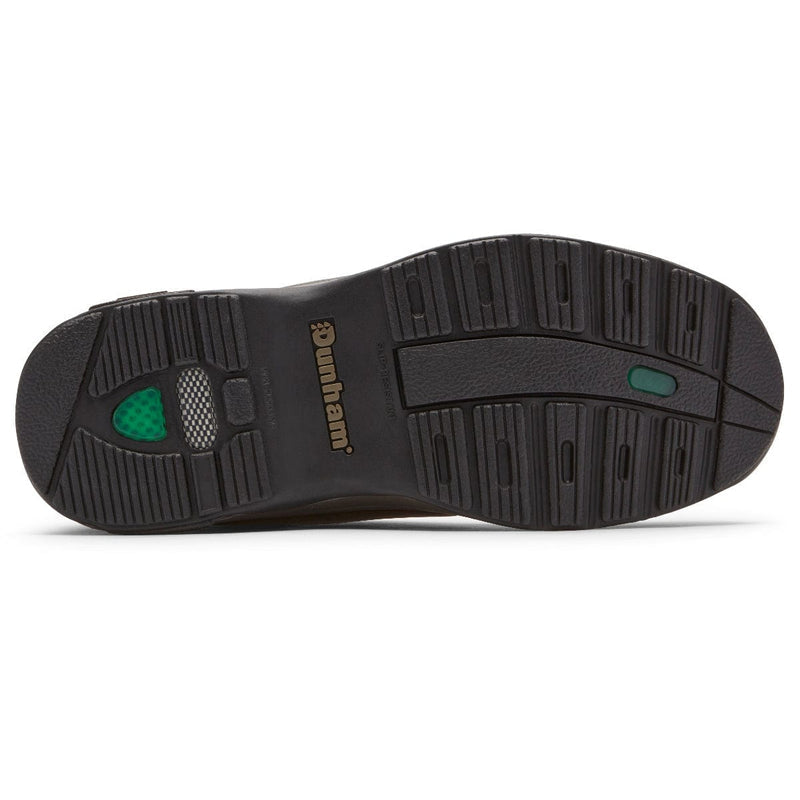 Dunham 8000 Mid Waterproof Boot outsole in black rubber with textured tread pattern and branding, sole/bottom view.