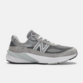 New Balance 990v6 running shoes in gray with suede and mesh upper, white midsole, and "N" logo, side view.
