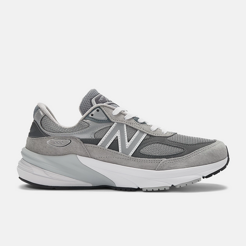 New Balance 990v6 running shoes in gray with suede and mesh upper, white midsole, and "N" logo, side view.