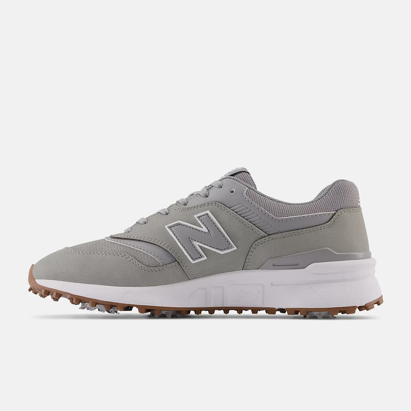 New Balance Golf 997 Golf shoes in light gray with a suede and mesh upper, white midsole, and spiked gum outsole, side view.
