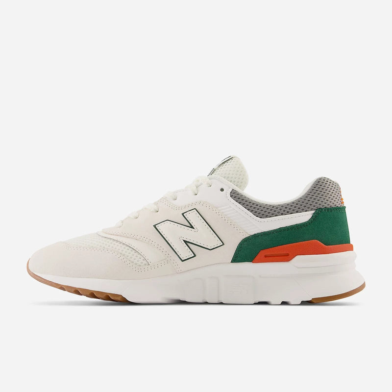 New Balance 997H sneakers in white with green and orange suede accents, gray mesh details, and gum outsole, side view.