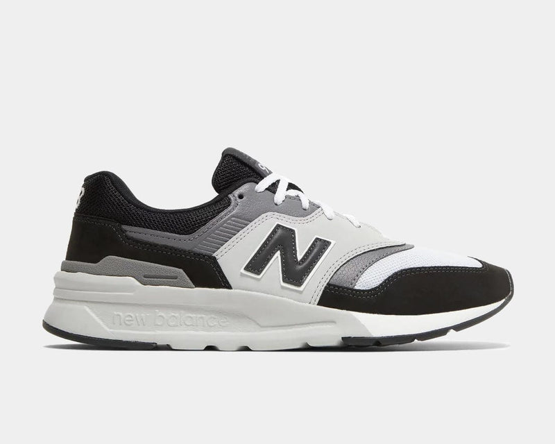 New Balance 997H sneakers in black, gray, and white with a suede and mesh upper, side view showing iconic "N" logo.