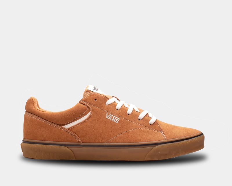 Vans Seldan sneakers in burnt orange suede with white laces, side view showing logo detailing and gum rubber sole.