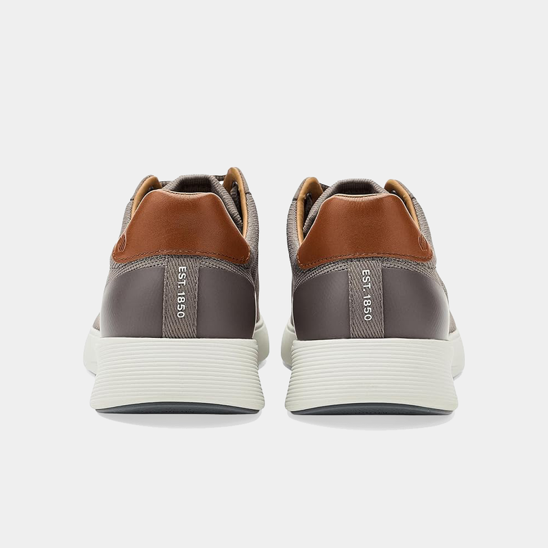 Johnston & Murphy Ackerson Knit Plain Toe shoes back view showing brown leather accents, gray knit panels, and white textured soles.