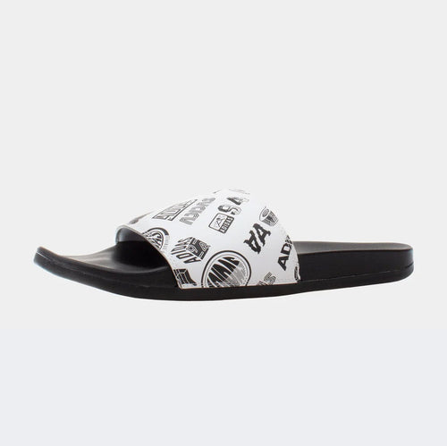 Adidas Adilette Comfort Slides with white printed strap and black footbed, side view.