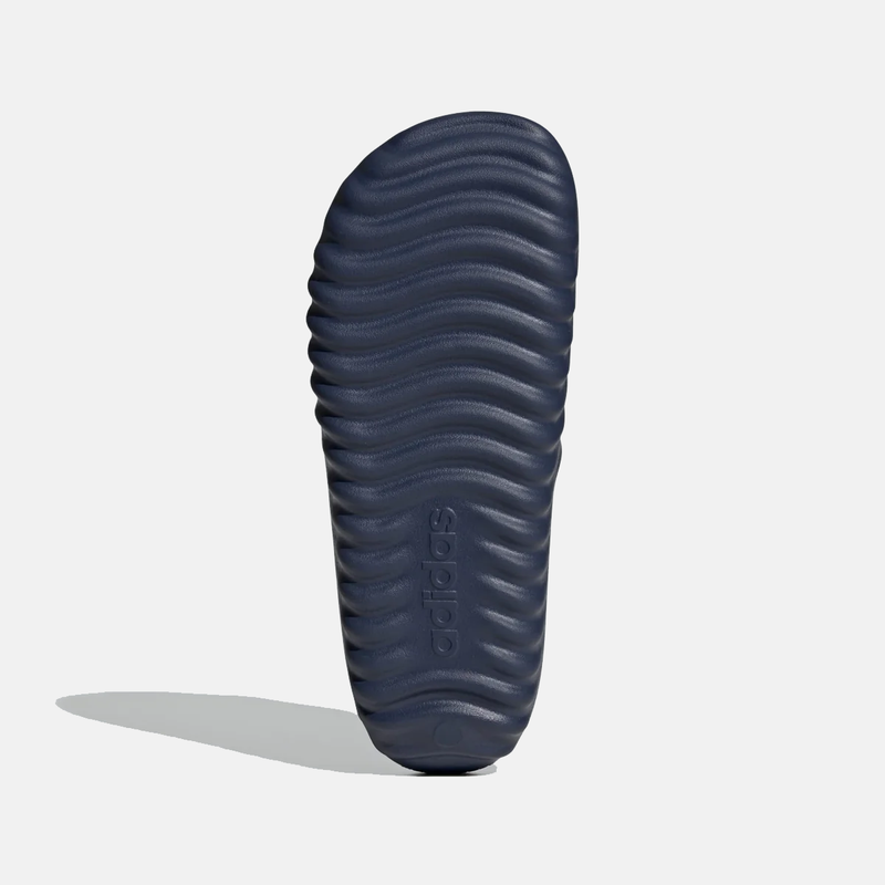 Adidas Adissage 360REC slides outsole showing textured wavy grip and embossed logo in navy blue.