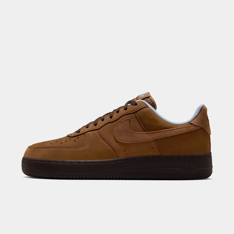 Nike Air Force 1 '07 sneakers in brown suede with tonal swoosh logo and dark brown sole, side view.