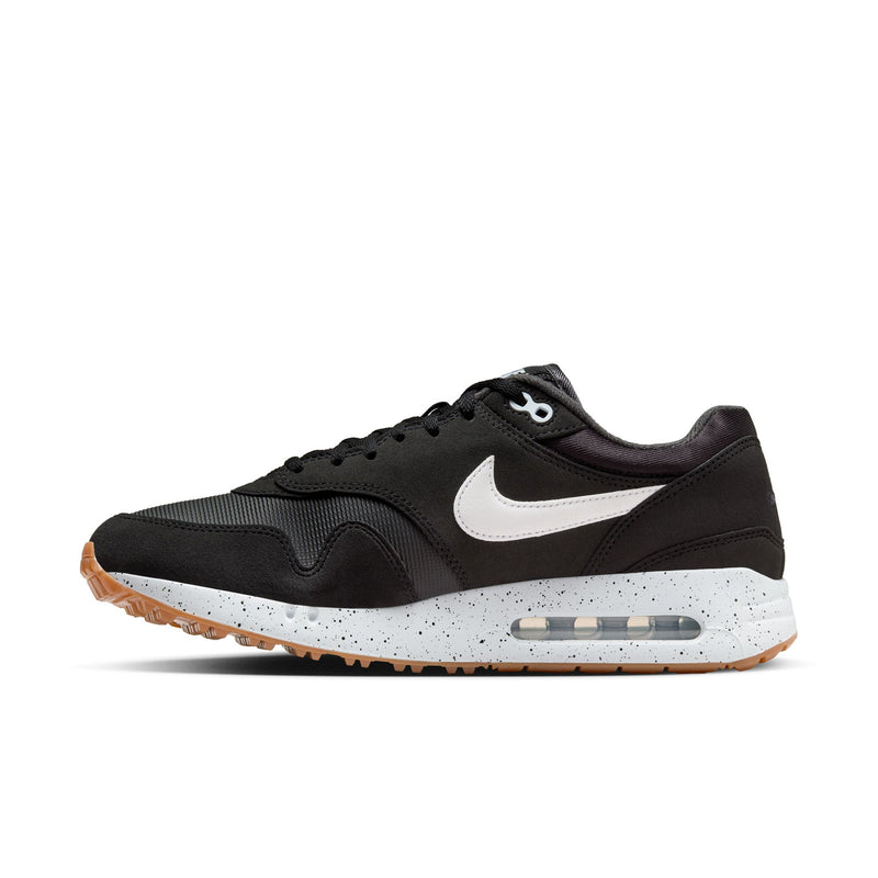 Nike Air Max 1 '86 OG Golf shoes in black with white Swoosh, speckled midsole, and gum outsole, side view