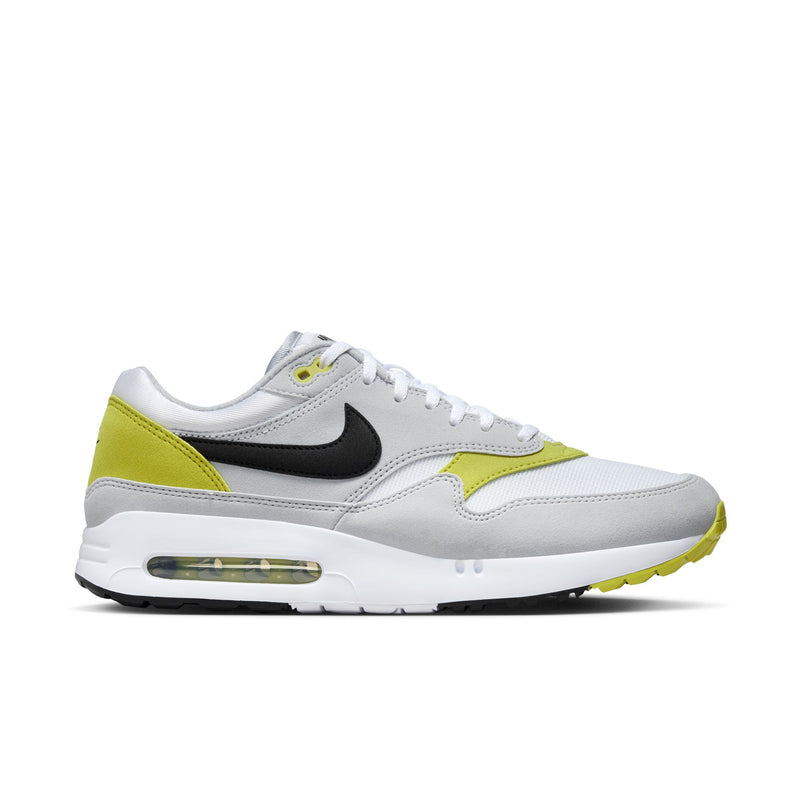 Nike Air Max 1 '86 OG Golf shoes in white, gray, and yellow with black Swoosh and visible Air unit, side view.