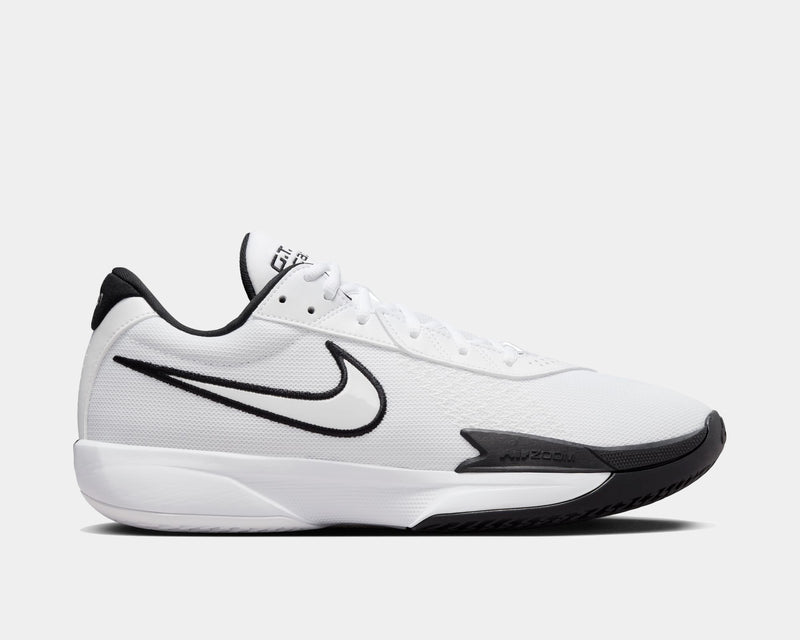 Nike Air Zoom G.T. Cut Academy basketball shoes in white with black accents, mesh upper, and Zoom Air cushioning, side view.