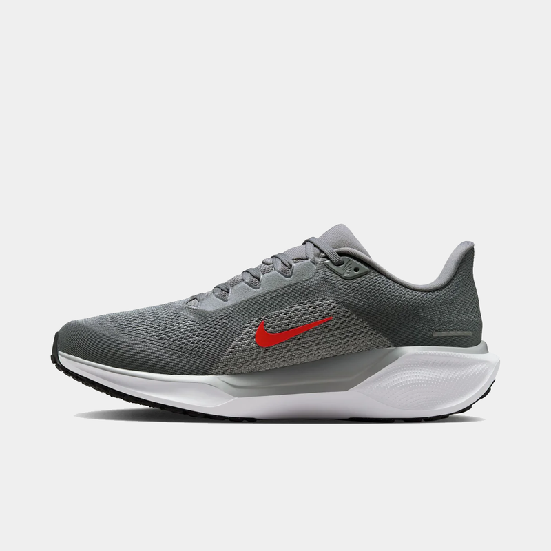 Gray running shoe with a red Nike logo on a white background