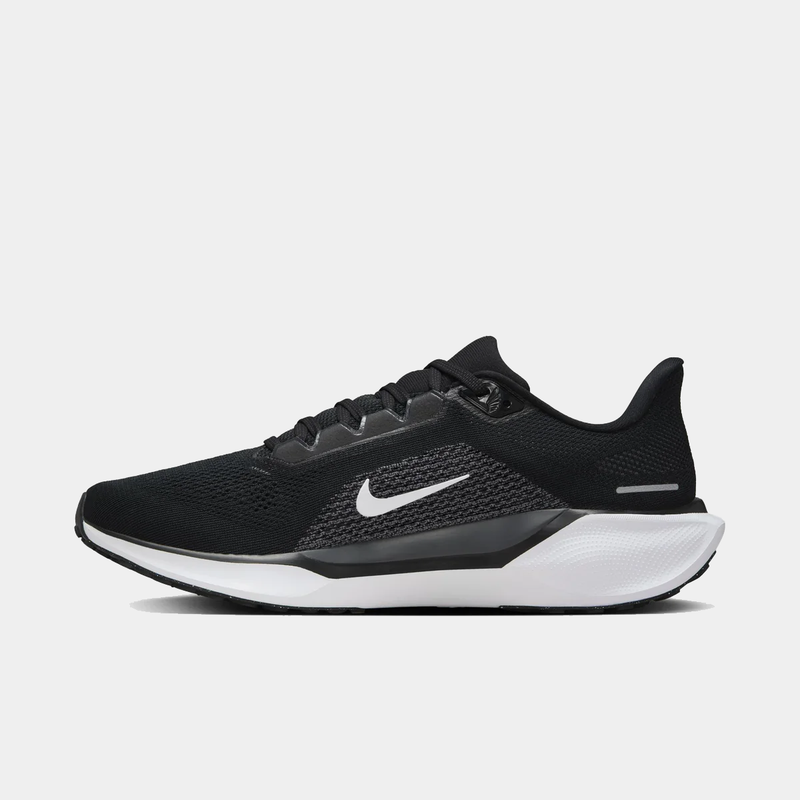 A pair of black and white Nike Air Zoom Pegasus 41 running shoes with red accents on a white background.
