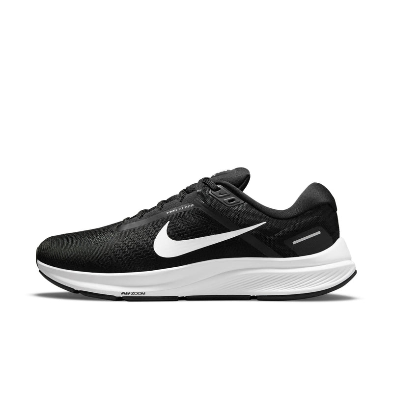 Nike Air Zoom Structure 24 running shoes in black with a breathable mesh upper, white midsole, and signature Swoosh logo, side view.