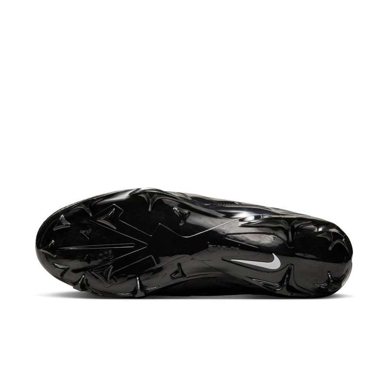 Nike Alpha Menace Elite 4 football cleats outsole in glossy black with angular stud pattern for superior traction.