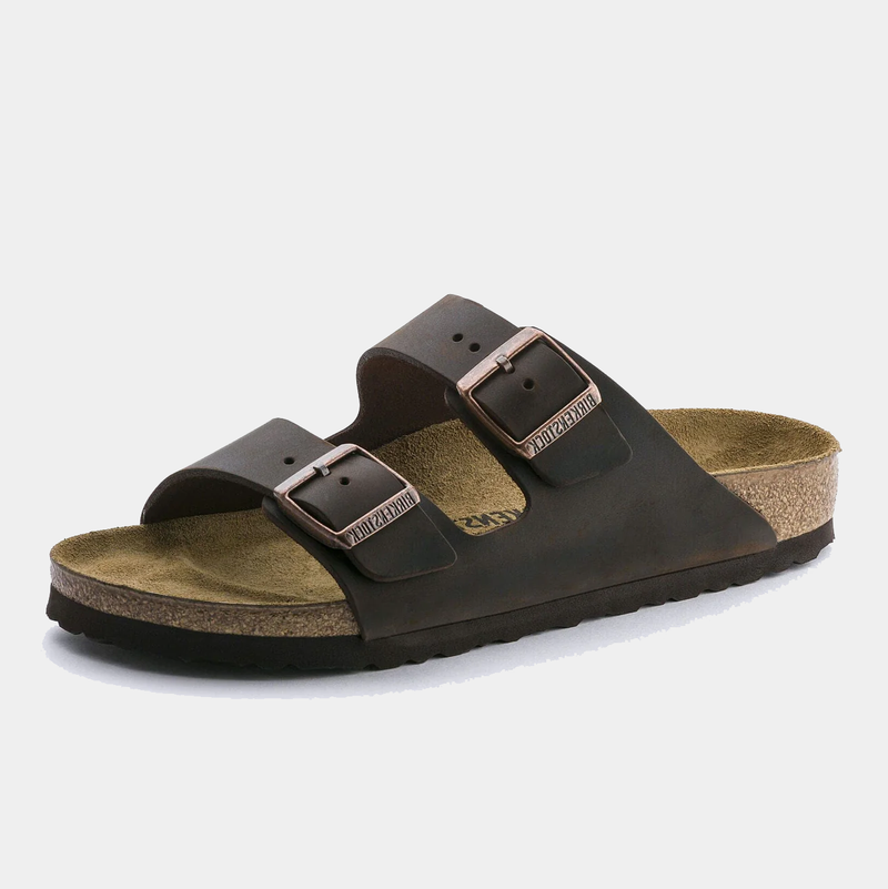 Birkenstock Arizona Oiled Leather sandals in dark brown with adjustable buckled straps and contoured cork footbed, side view.
