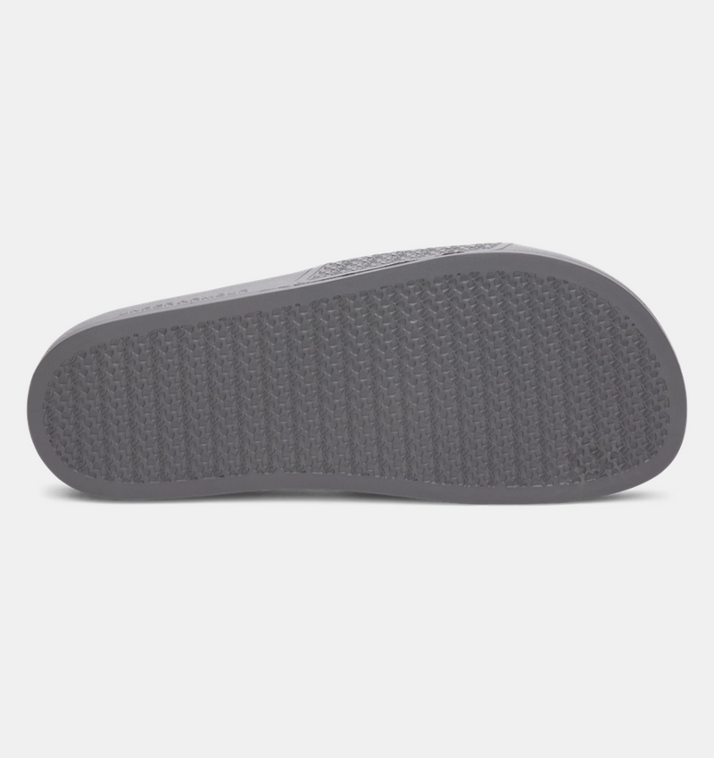 "Under Armour ARMR Shower sandals in gray with textured sole, bottom view"