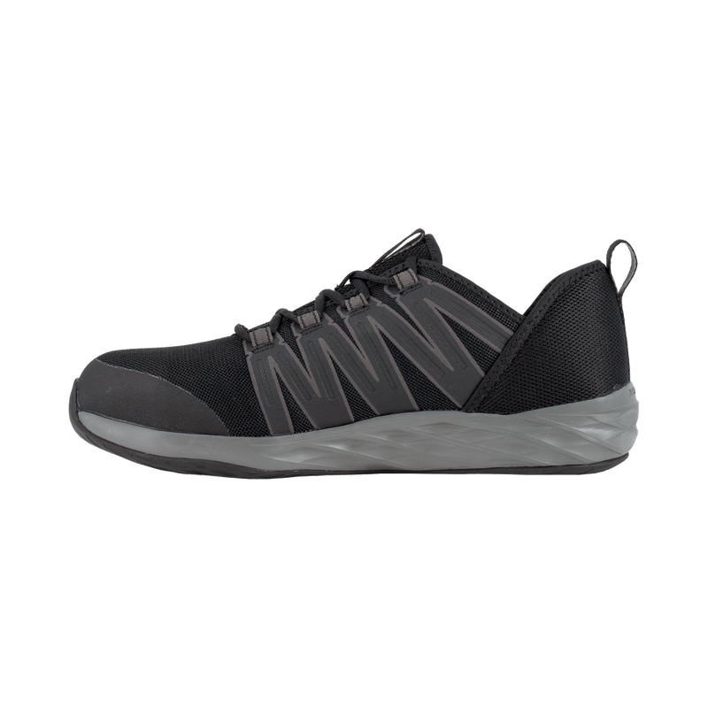 Reebok Work Astroride Work shoes in black with mesh upper, gray zigzag overlays, and cushioned sole, side view.