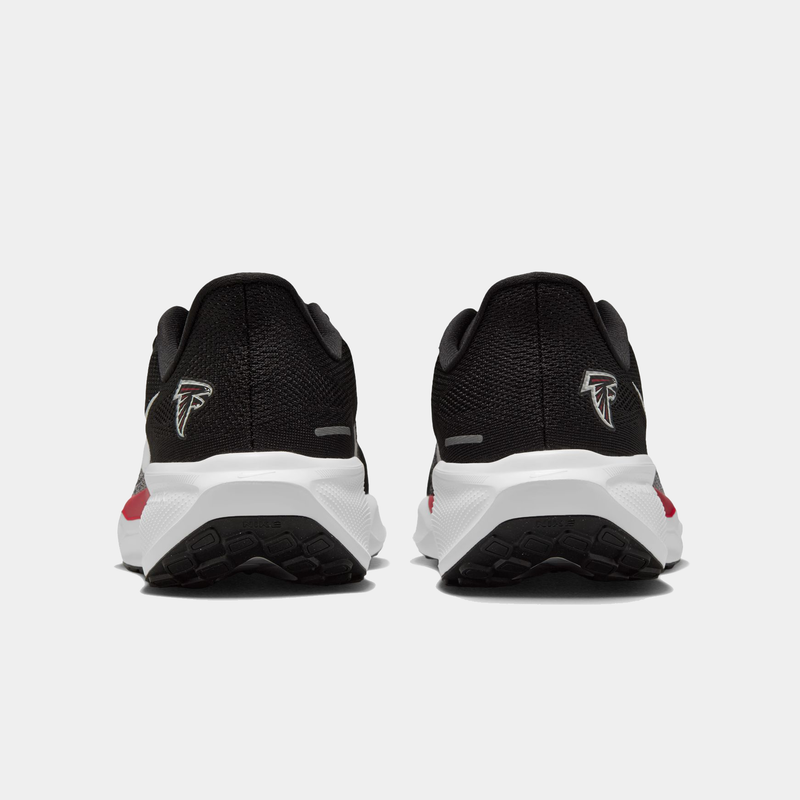 Nike Atlanta Falcons Pegasus 41 running shoes in black with team logo on heel, white midsole, and black outsole, back view.