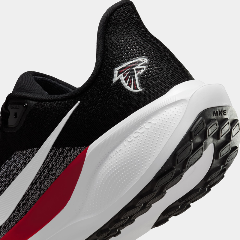Nike Atlanta Falcons Pegasus 41 running shoes, side view showcasing black mesh upper, team logo, red accent, and white React foam midsole.