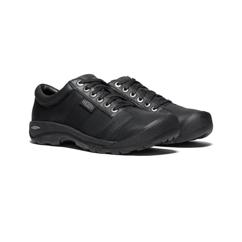 Keen Austin casual shoes in black leather with lace-up closure and durable rubber outsole, angled side view.