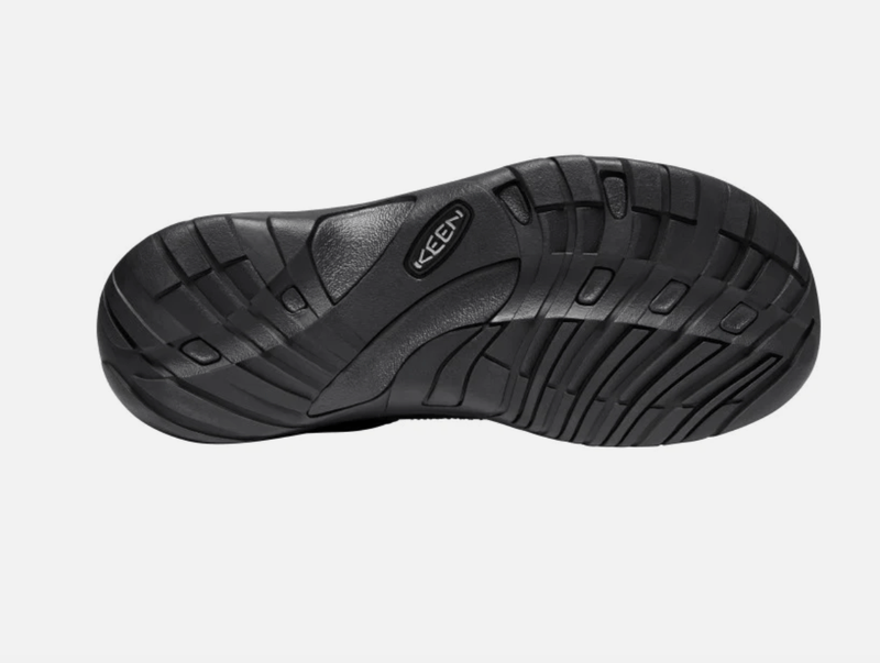 Keen Austin shoe outsole in black rubber featuring textured tread pattern and embossed brand logo, sole/bottom view.