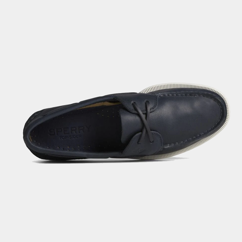 Sperry Authentic Original™ Cross Lace boat shoe in navy leather with moc toe stitching and white rubber outsole, top view.