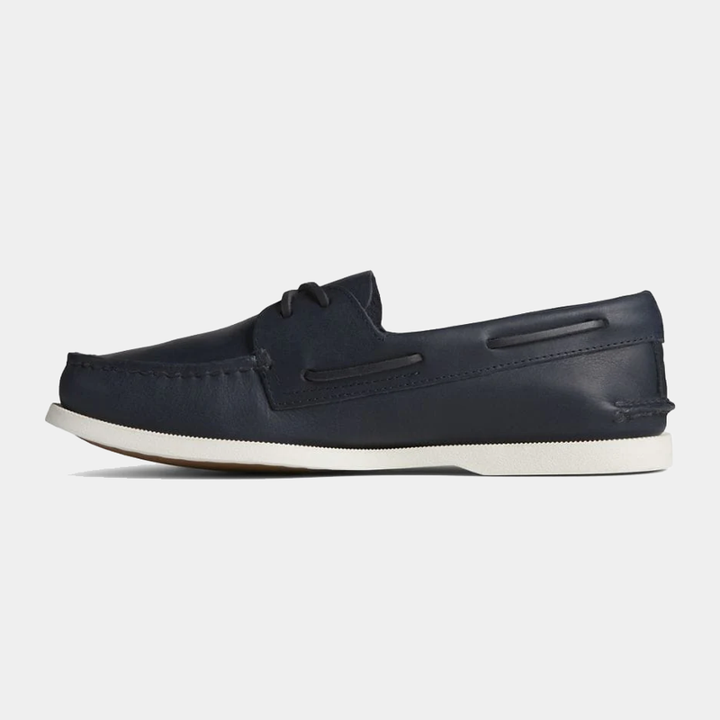 Sperry Authentic Original™ Cross Lace boat shoes in navy leather with moc-toe stitching and white non-slip sole, side view.
