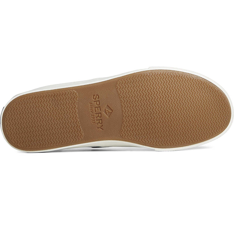 Sperry Bahama II Linen Sneaker outsole showing non-marking rubber sole with wave-like siping pattern in light brown.