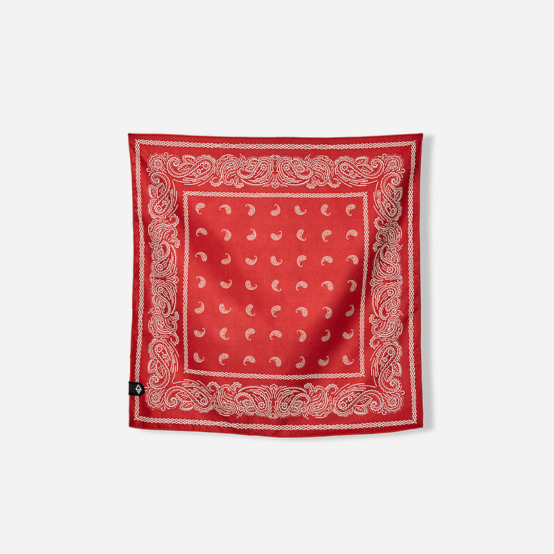 Nomadix Bandana Towel in bright red with white paisley design and soft microfiber material, flat front view.