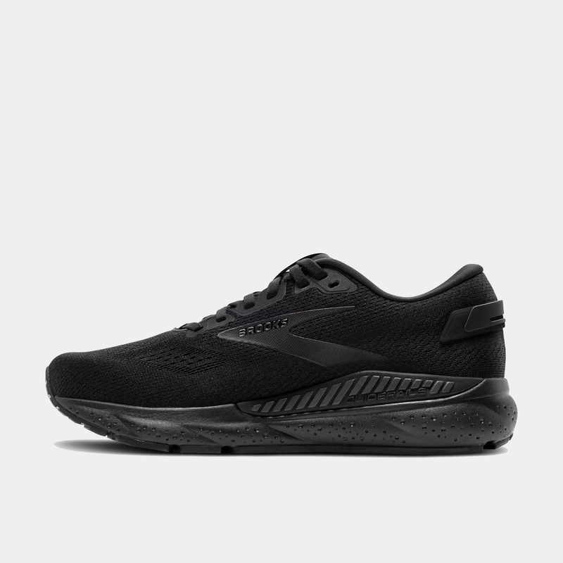 A pair of Brooks Beast GTS 24 running shoes with all black color way, featuring the Brooks logo on the side.