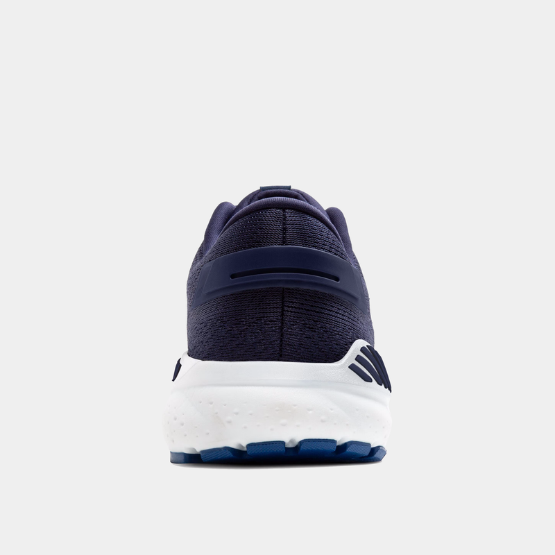 Navy blue sneaker with white sole on a light gray background