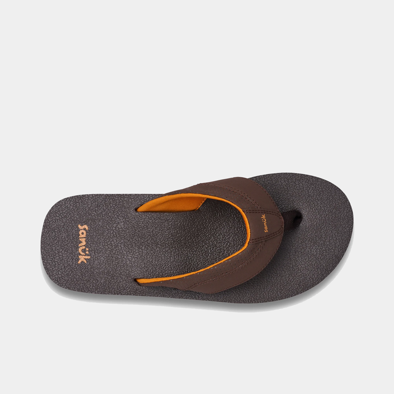 Sanuk Beer Cozy IV sandals in dark brown with textured footbed and orange lining, top view displaying thong strap design.