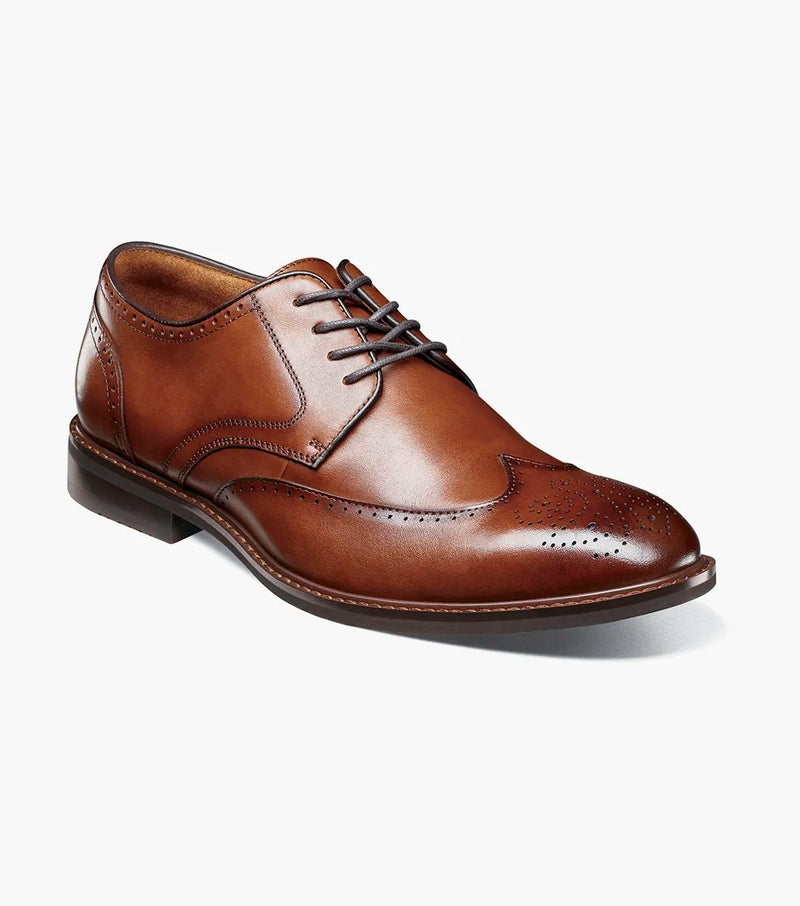 Stacy Adams Bennett Wingtip Oxford shoes in cognac leather with brogue detailing and closed lacing, angled front view.