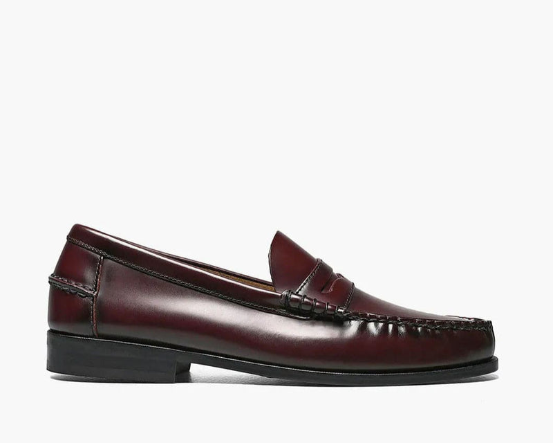 Florsheim Berkley Penny Loafer dress shoes in burgundy leather with moc-toe stitching and low heel, side view.