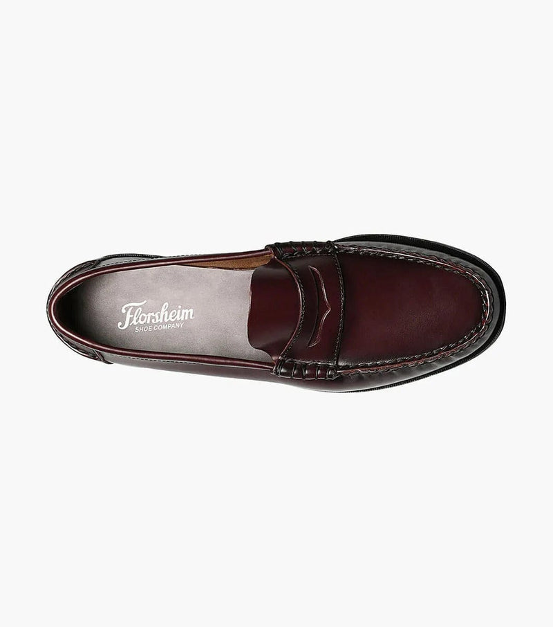 Florsheim Berkley Penny Loafer in burgundy leather with moc toe stitching, top view showing cushioned insole and slip-on design.