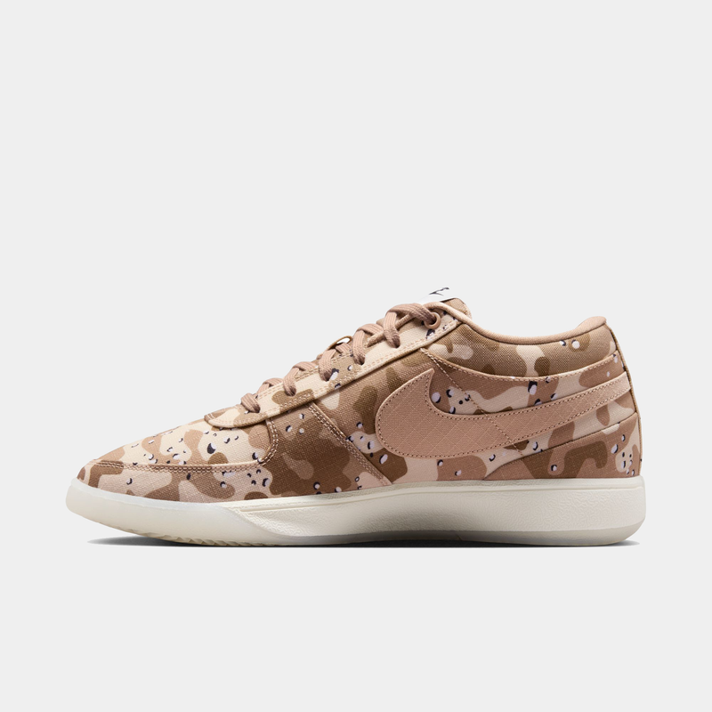 Nike Book 1 SE sneakers in beige and brown camo print with tan suede Swoosh, low-top design, side view.