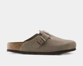 Birkenstock Boston Soft Footbed clogs in taupe suede with adjustable buckle strap and contoured sole, side view.