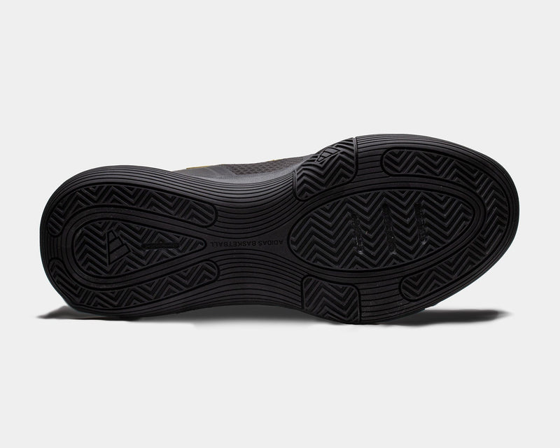 Adidas Bounce Legends basketball shoes outsole in black with herringbone traction pattern, sole/bottom view.