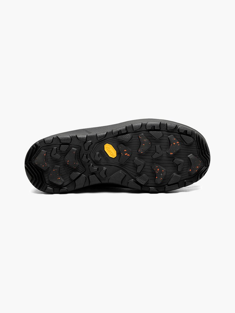 Black shoe sole with a yellow logo on a white background