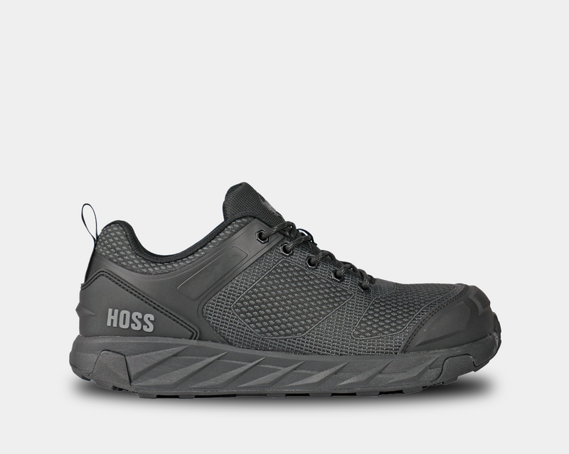 Hoss Buster Low work shoes in black with a durable mesh upper, reinforced toe, and cushioned sole, side view.