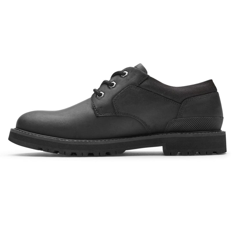 Dunham Byrne Oxford shoes in black leather with durable stitching, lace-up design, and textured outsole, side view.