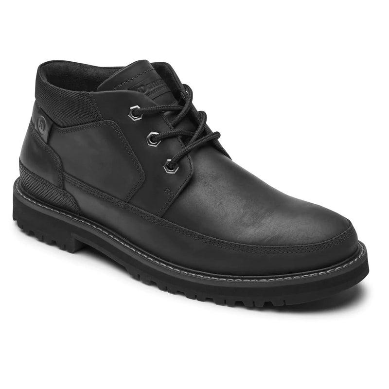 Dunham Byrne Waterproof Chukka Boot in black leather with lace-up closure, padded collar, and durable lug sole, side angle view.